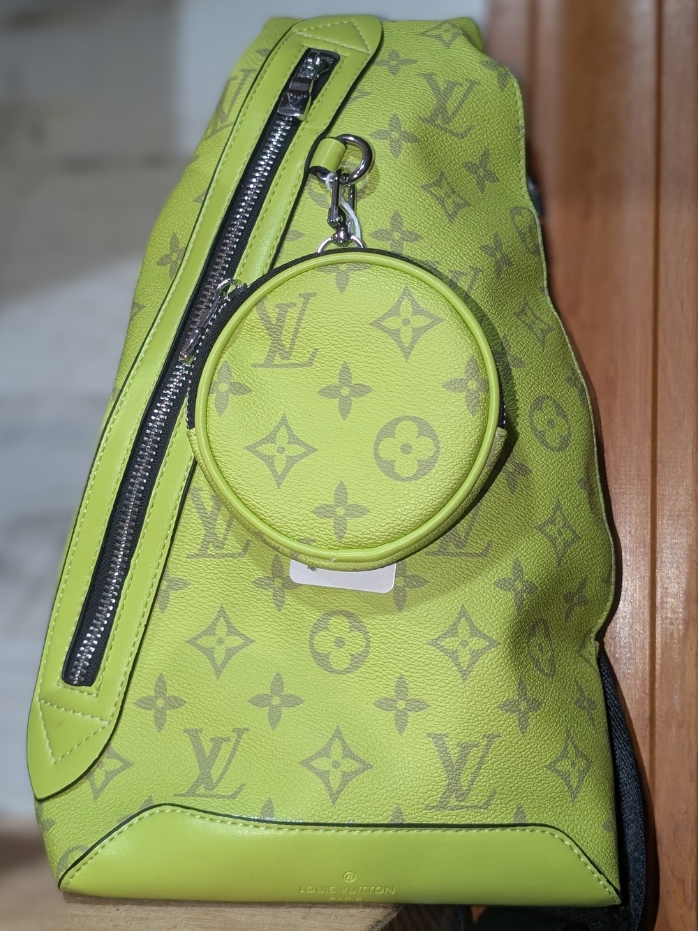 Fashion Inspired Lime Monogram Sling Backpack with Detachable Round Pouch